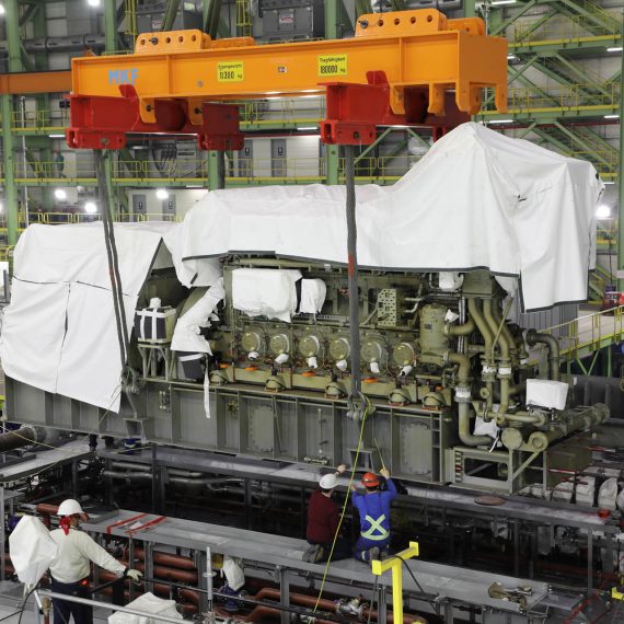 The aft engines of Ship 3, the future HMCS Max Bernays, are mounted in place on the ship's centre mega-block.